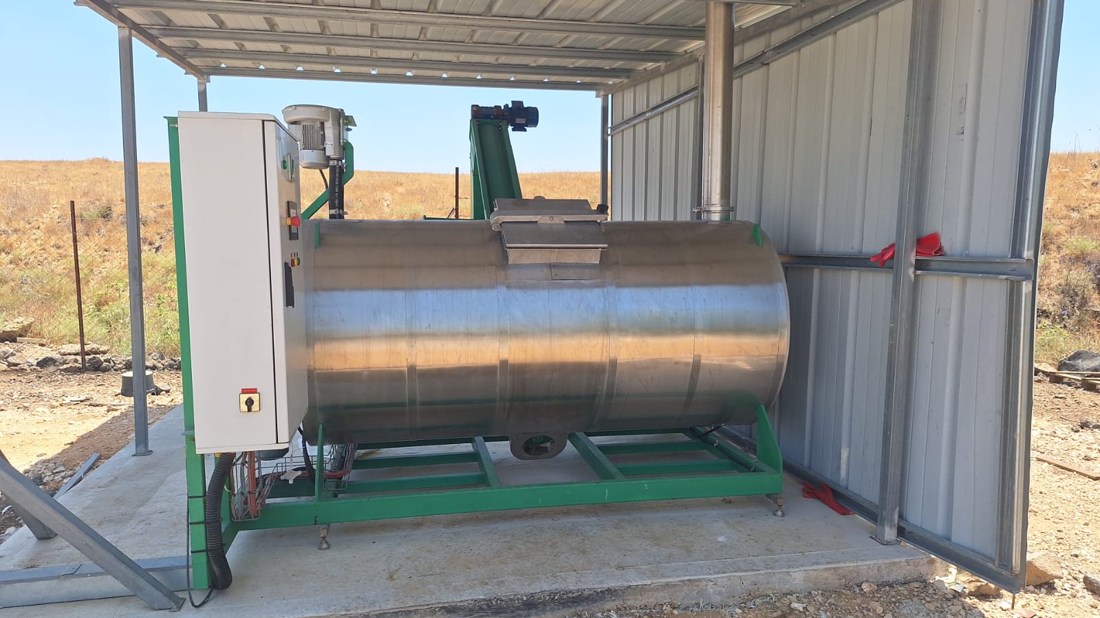 MAOF 1500L dehydrator installed beneath a protective shelter