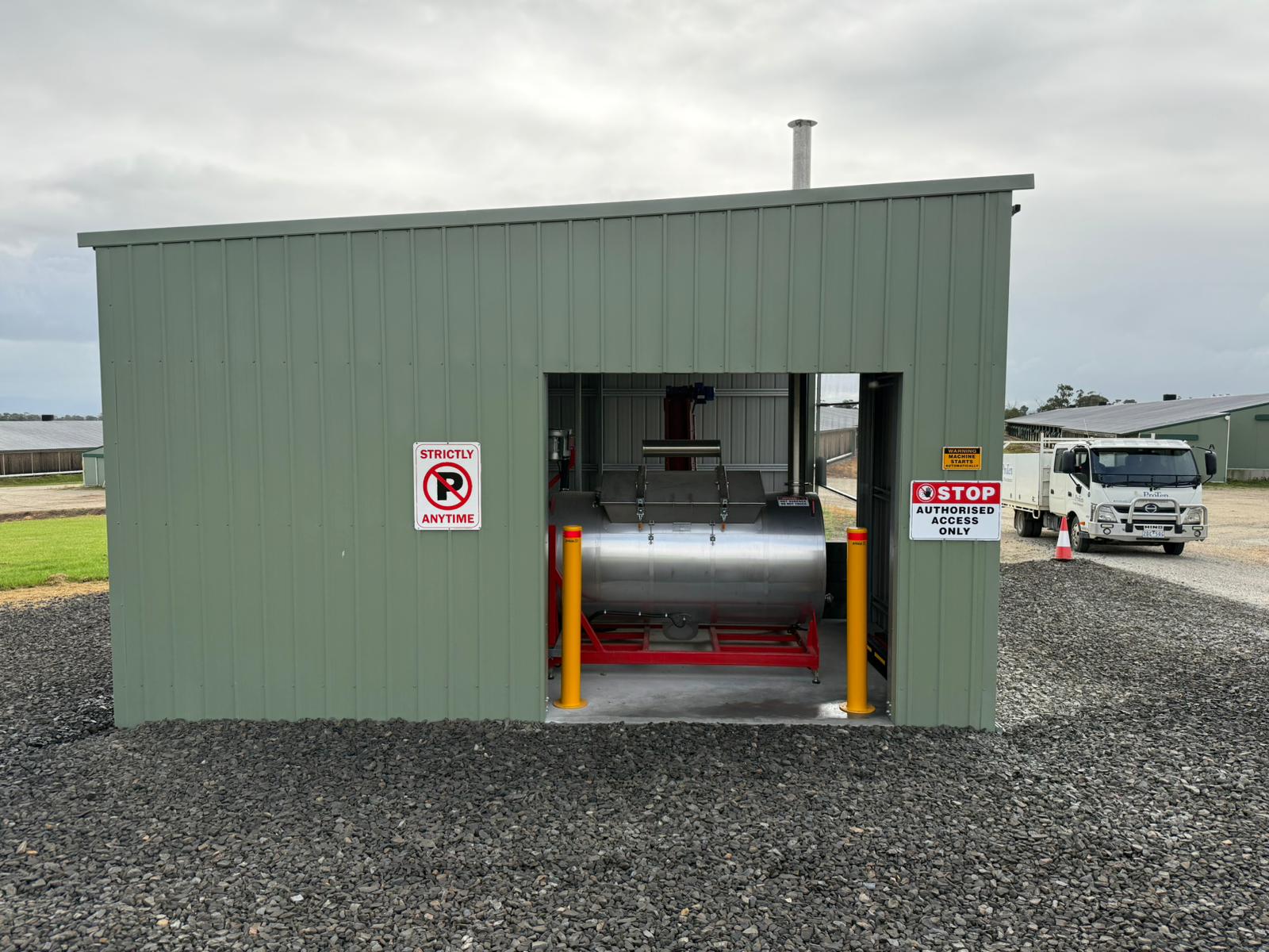 MAOF poultry mortality dehydrator installed in a dedicated field structure